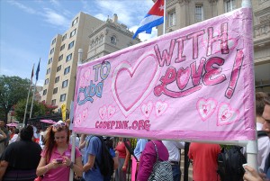 Members of CodePink, a nonprofit group that opposes the U.S. embargo against Cuba, celebrate July 20 in front of the newly inaugurated Cuban Embassy in Washington.