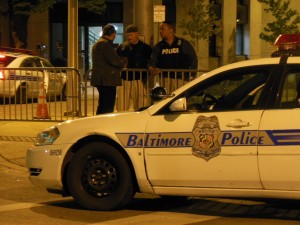 Baltimore City police on night duty at the War Memorial.  (Anthony C. Hayes)