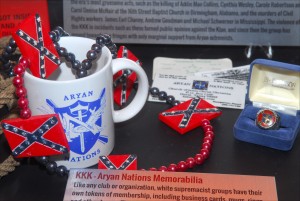 Key chains, coffee mugs, business cards and other memorabilia from the Ku Klux Klan and Aryan Nations are on display at the National Museum of Crime & Punishment in Washington DC, as part of a permanent exhibit on domestic terrorism and hate crimes. (Larry Luxner)